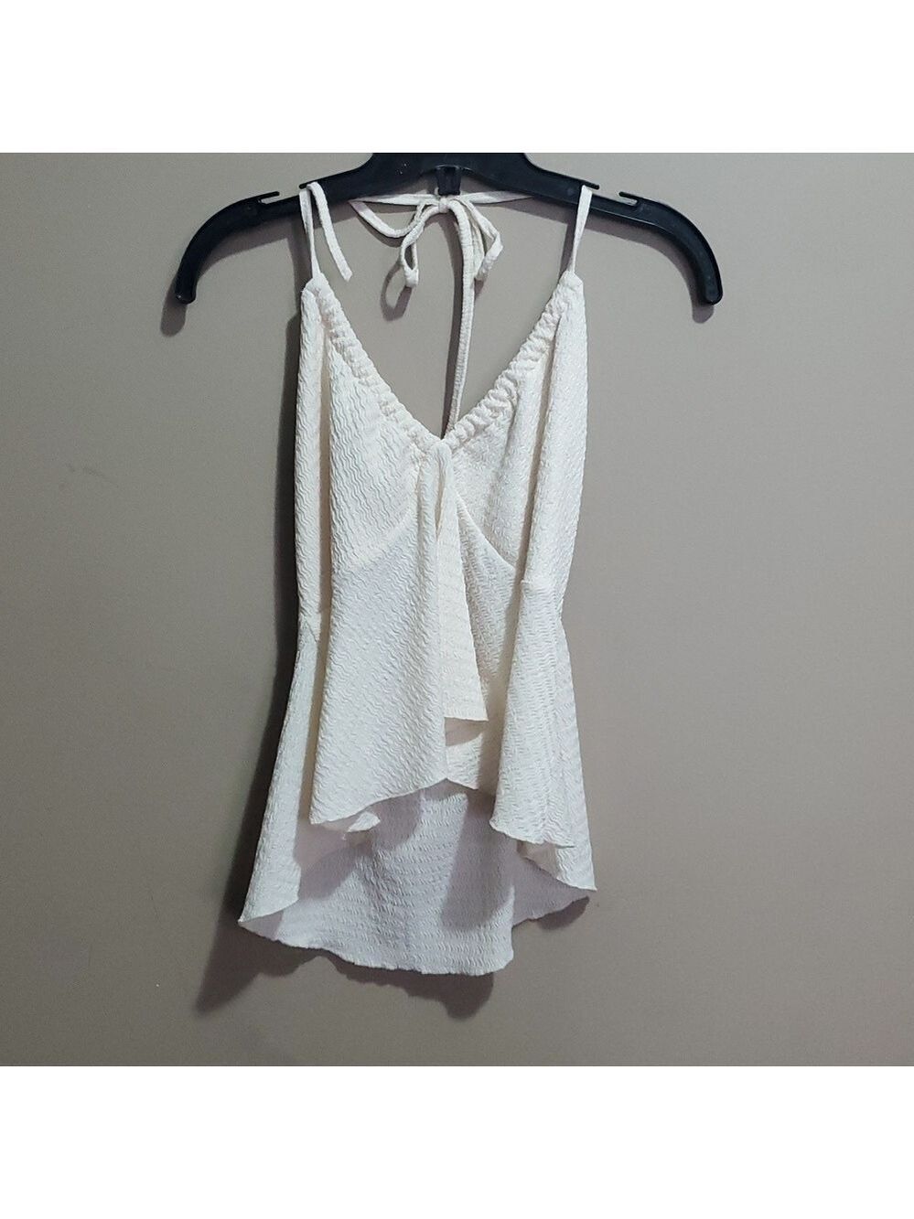 Cream halter style top size large